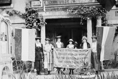 suffragists-holding-banner